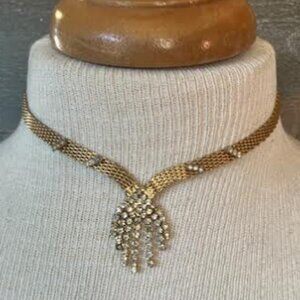 Gold tone Rhinestone choker necklace.